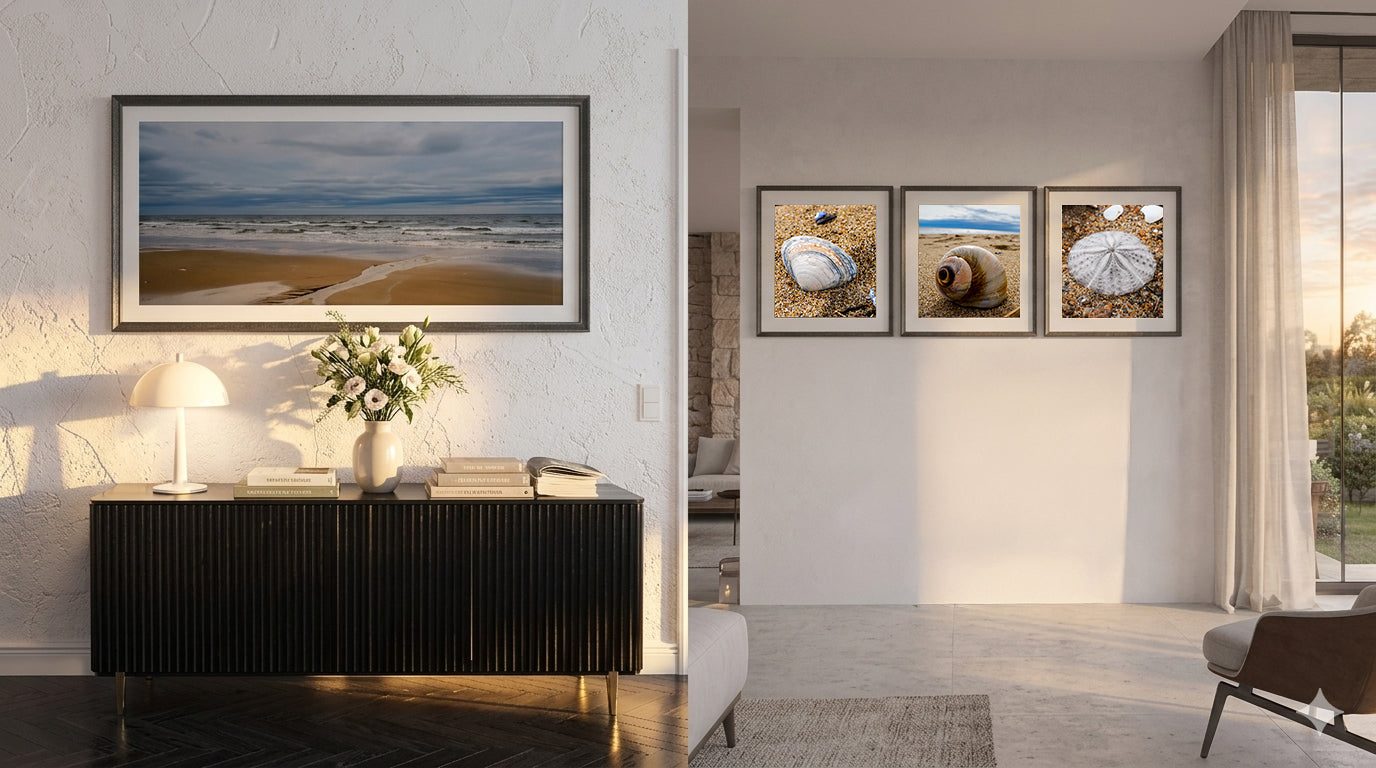 Modern interior with a console table and framed beach photos on the wall.